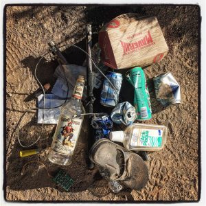 Trash on RV boondocking site in Utah