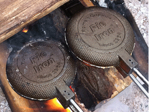 Pie iron over campfire