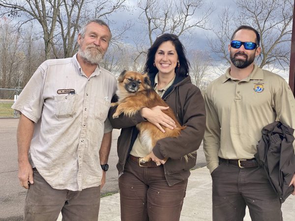 three volunteer park rangers