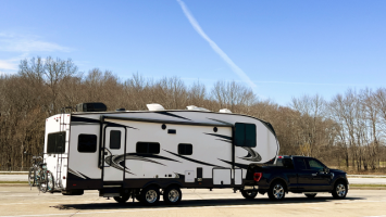 Fifth-wheel RV in a parking lot